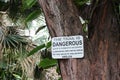 Warning sign at the beginning of the trail leading to the Red Sand Beach, Kaihalulu Bay