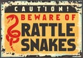 Beware of rattlesnakes caution sign Royalty Free Stock Photo