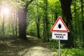 Warning sign Beware of ticks in forest Royalty Free Stock Photo