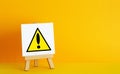 Warning sign on the board. Caution and attention. Warning about breakdown or danger. Dangerous area Royalty Free Stock Photo