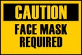 Warning sign with caution face mask required text. Coronavirus pandemic warning sign. Covid-19 public health measures.