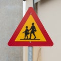 Warning sign of children crossing street from school Royalty Free Stock Photo