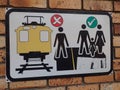 Warning sign on commuter train line, Cape Town, South Africa.