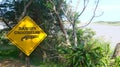 Warning sign, danger, warning about crocodiles