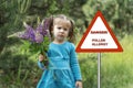 Warning sign: danger pollen allergy. the child suffers from pollen allergy Royalty Free Stock Photo