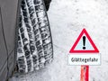 Warning sign: danger of slippery roads in winter in German