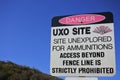 Warning sign Danger UXO Unexploded Ordnance site Royalty Free Stock Photo