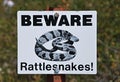 Warning Sign in Desert Mountain Landscape in Badlands National Park, South Dakota Royalty Free Stock Photo