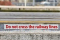 Warning sign Do not cross the railway lines Royalty Free Stock Photo