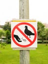 Warning Sign Do not feed birds in Park Royalty Free Stock Photo