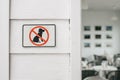 Warning sign dogs or pet not allowed on white door frame at the entry of coffee shop.Sticker at the entrance to the store.Prohibit