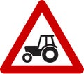 Warning sign with farm tractor Royalty Free Stock Photo