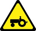 Warning sign with farm tractor Royalty Free Stock Photo