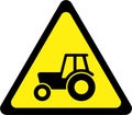 Warning sign with farm tractor Royalty Free Stock Photo
