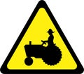 Warning sign with farm tractor Royalty Free Stock Photo