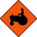 Warning sign with farm tractor Royalty Free Stock Photo