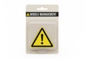 A warning sign for middle management in a blister pack Royalty Free Stock Photo