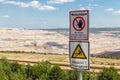 Warning sign near open pit mine Hambach in Germany