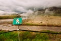 Warning sign of not crossing over rope fence.Caution of high temperature on golden circle tour near big geyser geothermal area.Ste Royalty Free Stock Photo