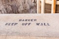 Danger, keep off wall Royalty Free Stock Photo