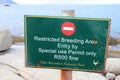 Warning sign for penguins at Boulders Beach Royalty Free Stock Photo