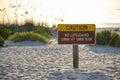 Warning sign poster on sea side beach saying that there is no lifeguard on duty Royalty Free Stock Photo