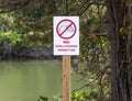 A Warning Sign Prohibiting Shellfishing in the Water