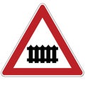 Warning sign. Railroad crossing with a barrier. Russia