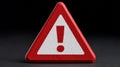 Warning sign with red border and exclamation mark on a dark background Royalty Free Stock Photo