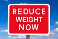 Warning sign REDUCE WEIGHT NOW Royalty Free Stock Photo
