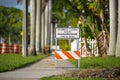 Warning sign that sidewalk is closed at street construction site. Utility work ahead Royalty Free Stock Photo