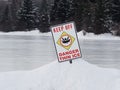Warning Sign At Skating Pond