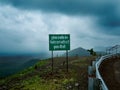 Warning Sign on Sloped Mountain Roads of India