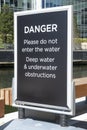 DANGER deep water sign at Canary Wharf, London.