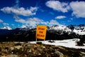A warning sign to stay on road while hiking a mountain Royalty Free Stock Photo