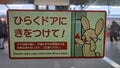 Warning sign in train in Tokio