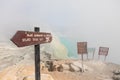 Warning signboard at wastelands in Kawah Ijen volcano crater at sulfur mine Royalty Free Stock Photo