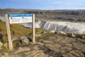 Warning signpost at Dettifoss waterfall in Iceland. It is in Icelandic and English language warning visitors on harzard