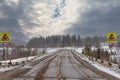 Warning signs in front of a railroad crossing Royalty Free Stock Photo