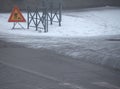 road works sign in the snow