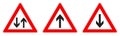 Warning - single/two way traffic sign. Black arrow in red triangle, version with arrow pointing up, down and both ways