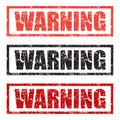 Warning stamp set in different colors on a white background Royalty Free Stock Photo