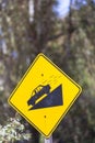 Warning steep road sign slope and car on hill, Argentina Royalty Free Stock Photo