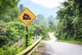 Warning steep road sign slope and truck on hill. Royalty Free Stock Photo