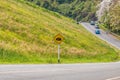 Warning steep road sign slope and truck on hill Royalty Free Stock Photo