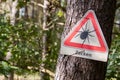 Warning before ticks in a german wood Royalty Free Stock Photo