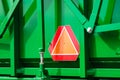 Warning triangle sign on agricultural machine Royalty Free Stock Photo