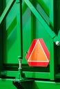 Warning triangle sign on agricultural machine Royalty Free Stock Photo