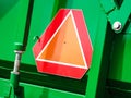 Warning triangle sign on agricultural machine Royalty Free Stock Photo