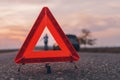 Warning triangle sign on the road